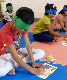 intuition kids doing blindfold activity